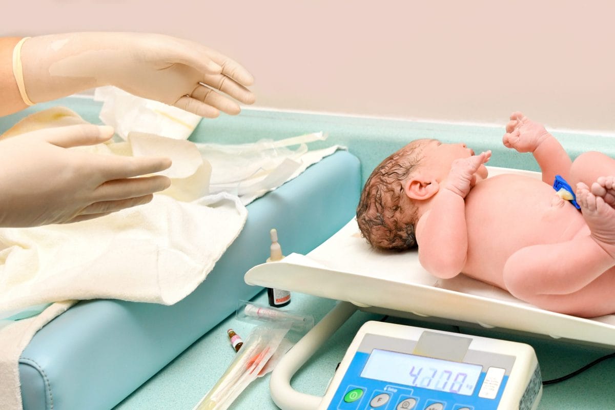 a-nurse-weighs-on-the-scales-of-a-newborn-baby-2022-09-23-23-16-40-utc-scaled.jpg?strip=all&lossy=1&fit=1200%2C801&ssl=1